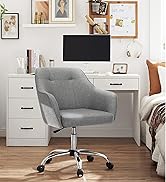 Configuration de bureau à domicile moderne avec bureau blanc, chaise de bureau rembourrée grise sur roulettes et présentoir mural avec illustrations et