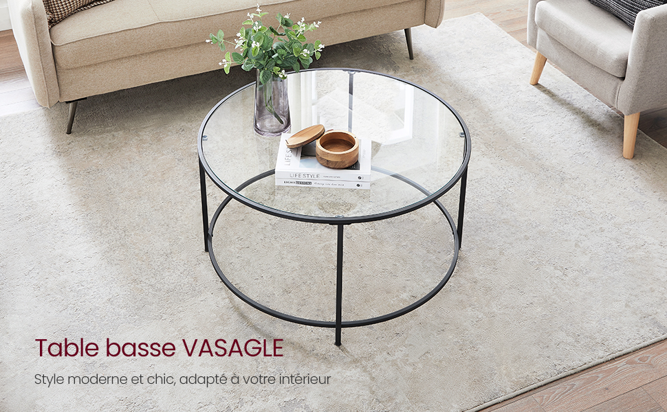 une table basse ronde avec plateau en verre.