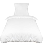 comprenant une housse de couette et une taie d'oreiller. La parure de lit présente un design épuré et minimaliste, sans motifs ni textures visibles.