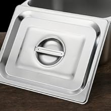 avec poignée centrale, présentant une finition de surface lisse et des bords relevés.