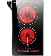 avec deux zones de chauffage circulaires rouges illuminées et commandes tactiles sur le bord inférieur