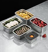Système modulaire de stockage des aliments avec plusieurs récipients transparents contenant divers ingrédients, disposés sur une surface grise.