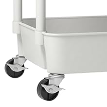 une brouette en plastique blanc avec roues