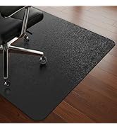 Série d'images montrant un tapis antifatigue texturé noir sur un plancher en bois foncé, avec des vues rapprochées de sa surface et de ses bords.