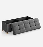 un canapé-lit modulable à dossier carré.