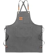 Tablier en toile grise avec bretelles croisées, poches multiples et détails en cuir. Comprend une sangle de cou et des liens de taille réglables pour un ajustement personnalisable.