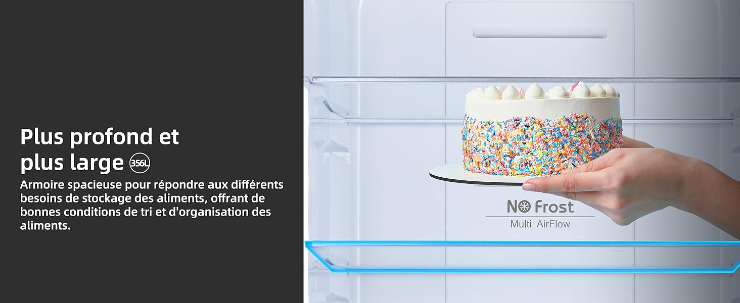 Gâteau blanc rond avec décoration colorée saupoudrée présenté au réfrigérateur avec indication « No Frost ».