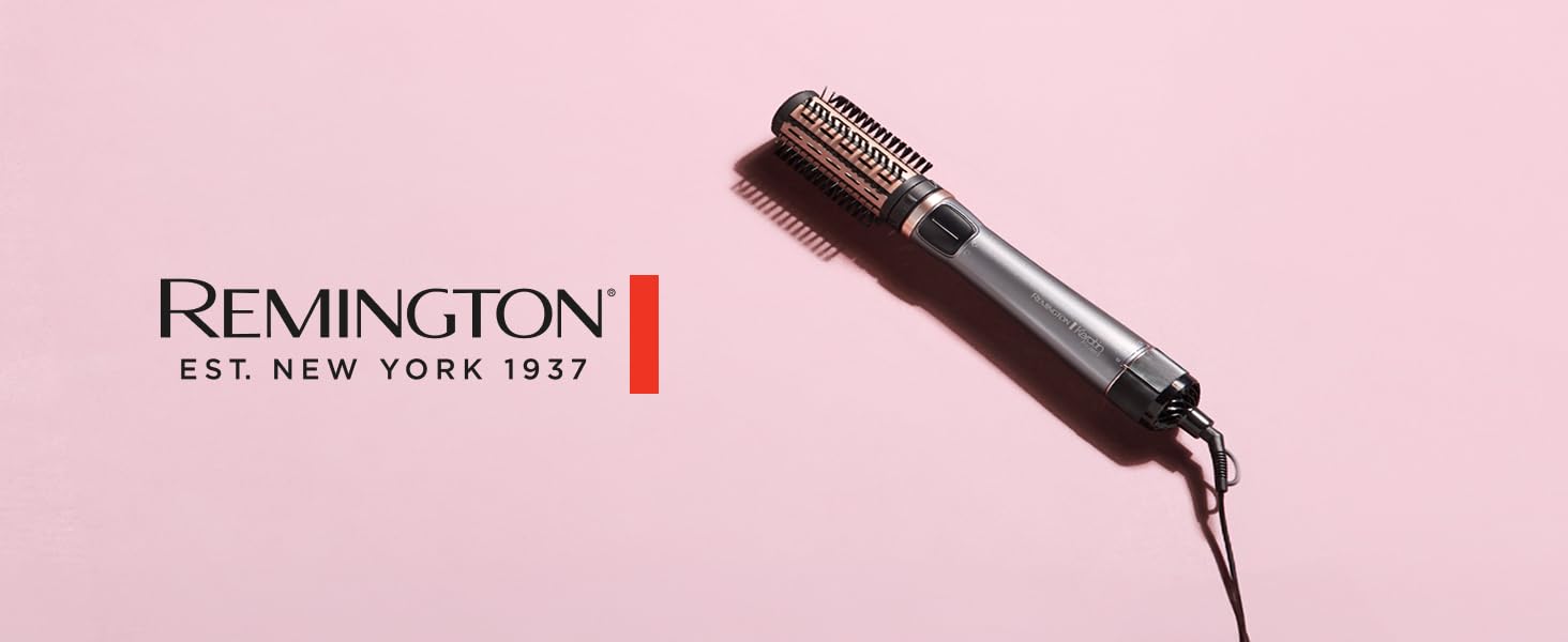 Le texte indique « REMINGTON ». Vue du produit de l'outil de coiffage professionnel noir avec des accents argentés sur fond rose.