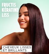 Le texte se lit comme suit : « FRUCTIS KERATIN LISS » et « CHEVEUX LISSES ET BRILLANTS ». Image marketing montrant les résultats des produits capillaires en mettant l'accent sur la texture lisse et brillante des cheveux.