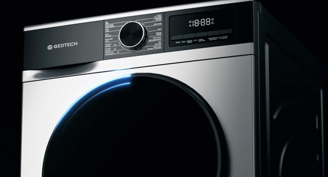 avec design argenté et noir. Comprend un affichage numérique indiquant 18:33, une grande porte circulaire avec éclairage bleu et un panneau de commande avec bouton