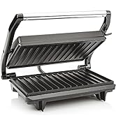 Le texte se lit comme suit : « Image 1 ». Presse à panini ou grill à sandwich électrique avec plaques de cuisson nervurées, montrées ouvertes à 180 degrés. Comprend des poignées en plastique noir et une finition gris métallisé.