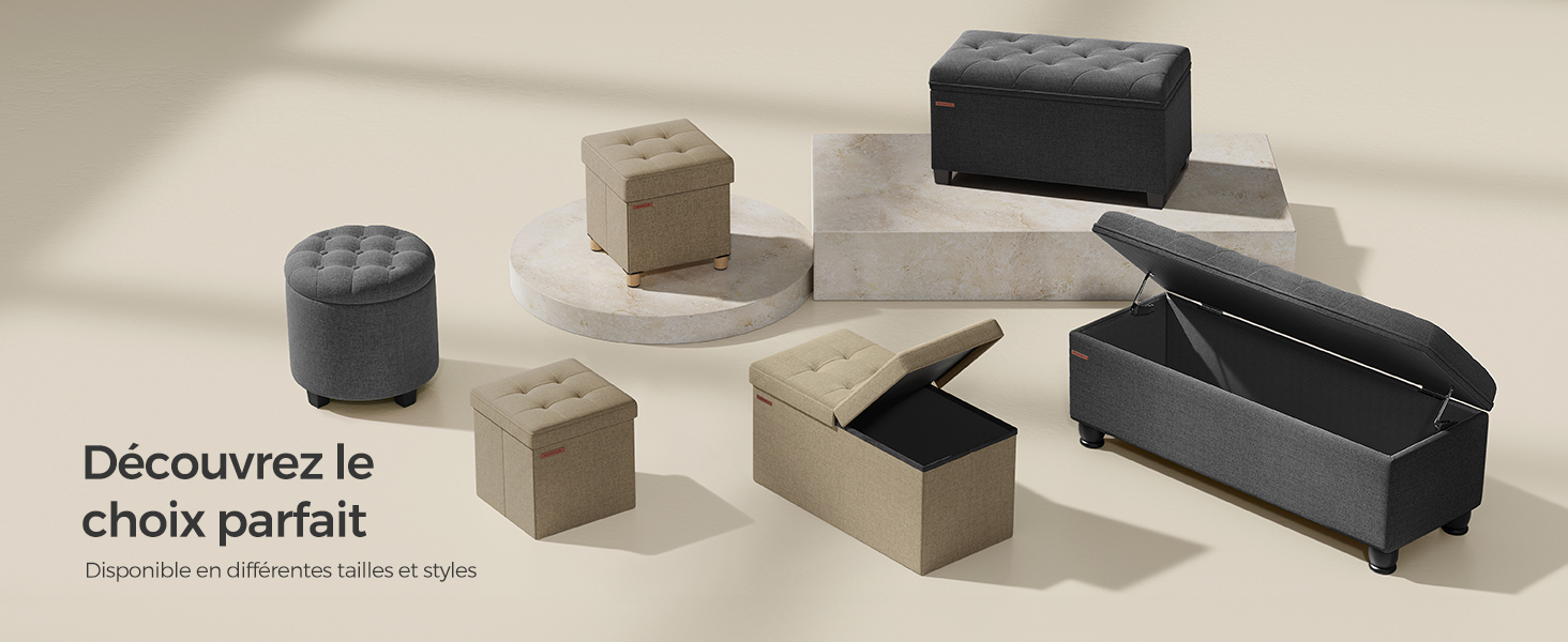 Collection de boîtes de rangement décoratives de différentes tailles, dans des tons gris, noirs et neutres, avec des couvercles à charnière